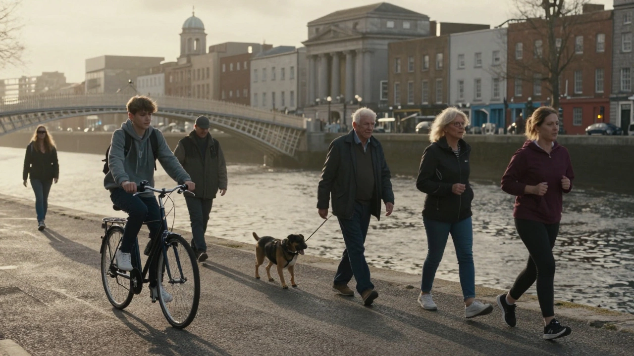 A group of Irish people jogging and walking along the River Liffey, all wearing trainers, with historic Dublin bridges in the distance.