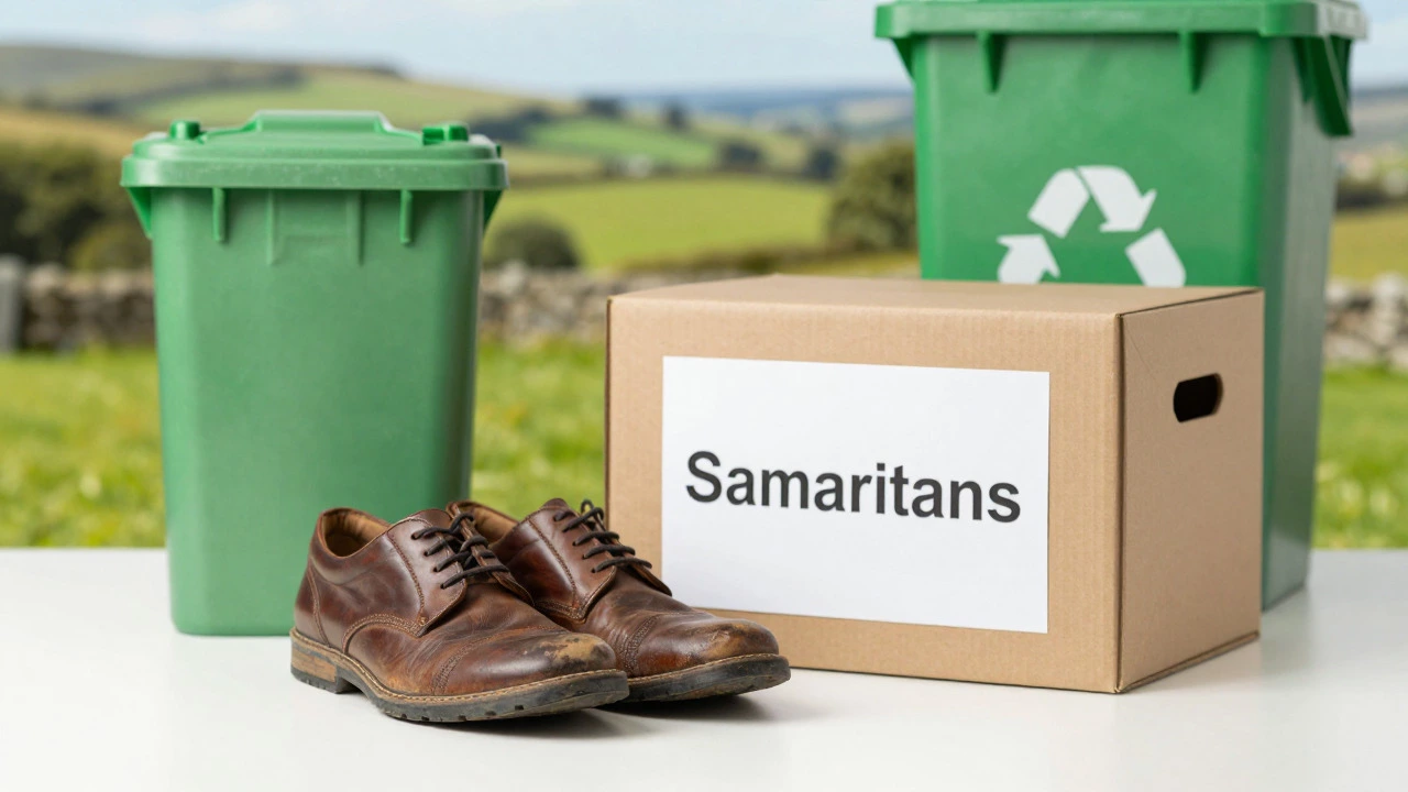 Old shoes near charity box and recycling bin for sustainable disposal