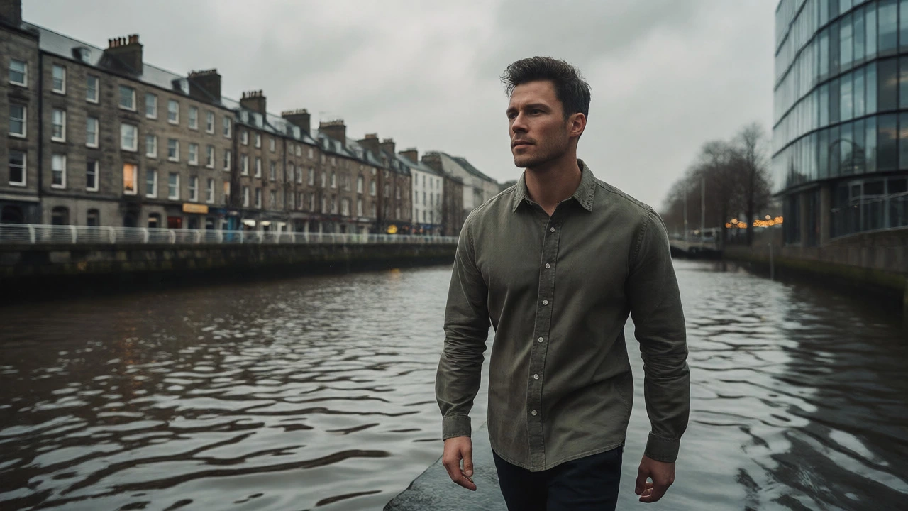 Man wearing a fitted shirt walking by the River Liffey in rainy Dublin
